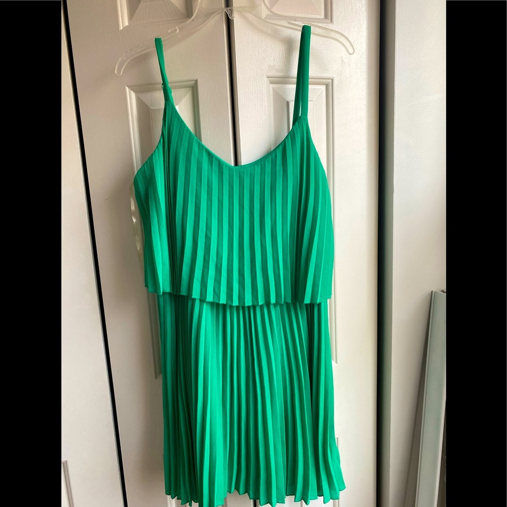Pleated green spaghetti strap dress
